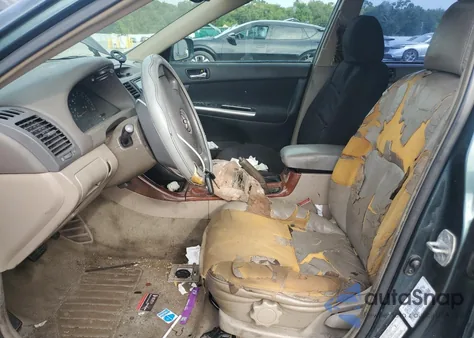 2003 Toyota Camry Le from USA, damaged, VIN 4T1BE32K33U668460